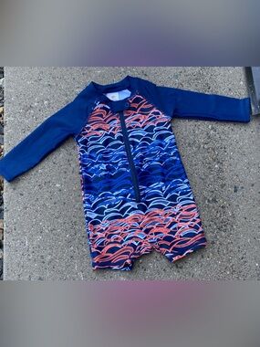 Tucker + Tate Navy Rashguard One-Piece with Coral & Light Blue Wave Print